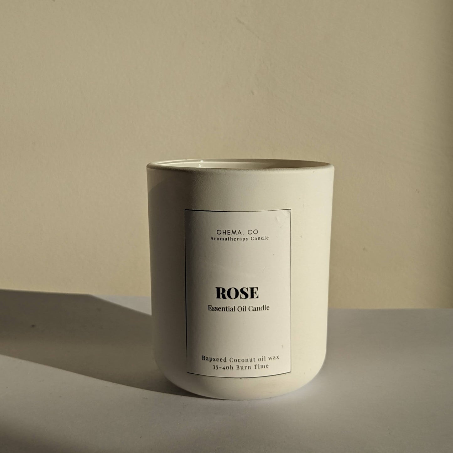 rose essential oil candle