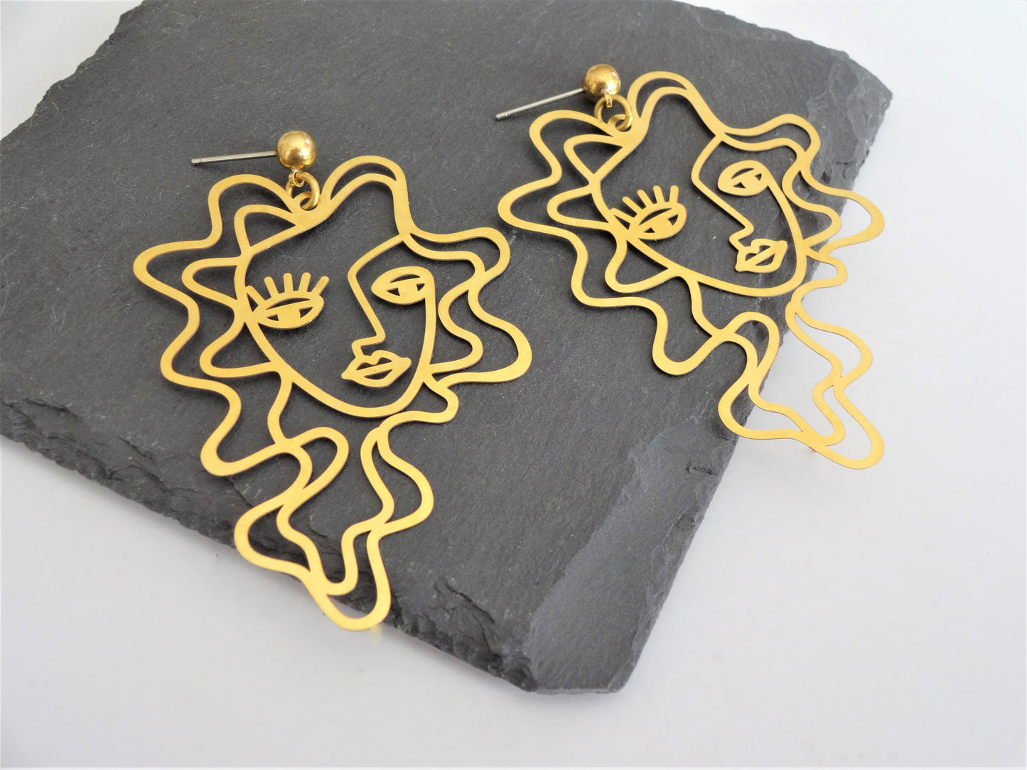 face earrings