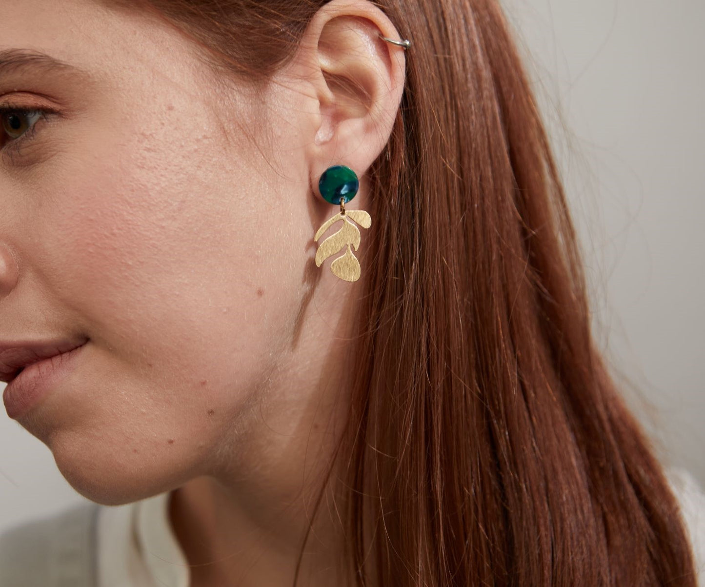 green and gold stud earrings