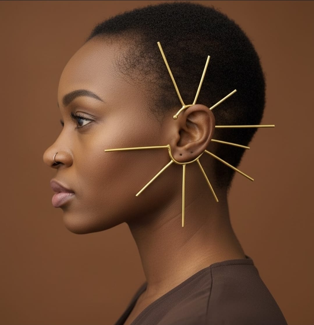 gold geometric ear cuff with radiating spikes.