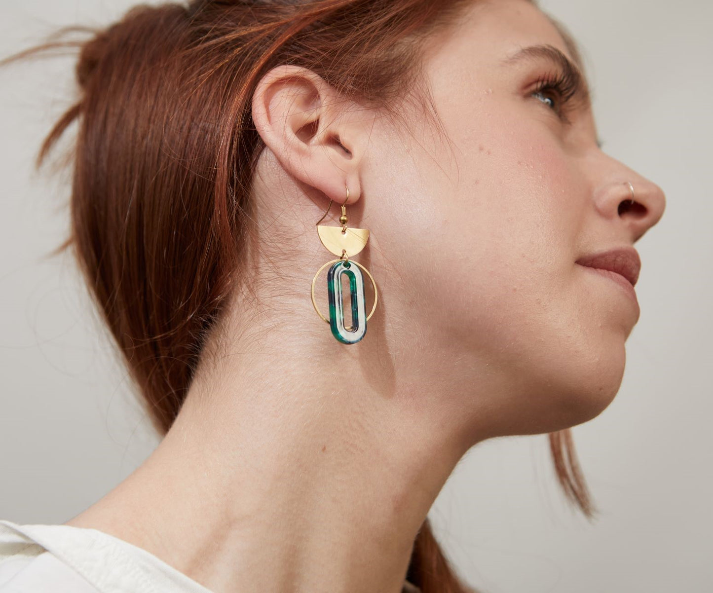 green dangle earrings